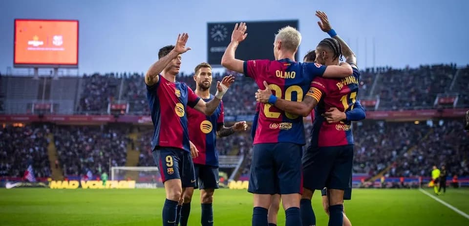 Barcelona players celebrating a goal during match