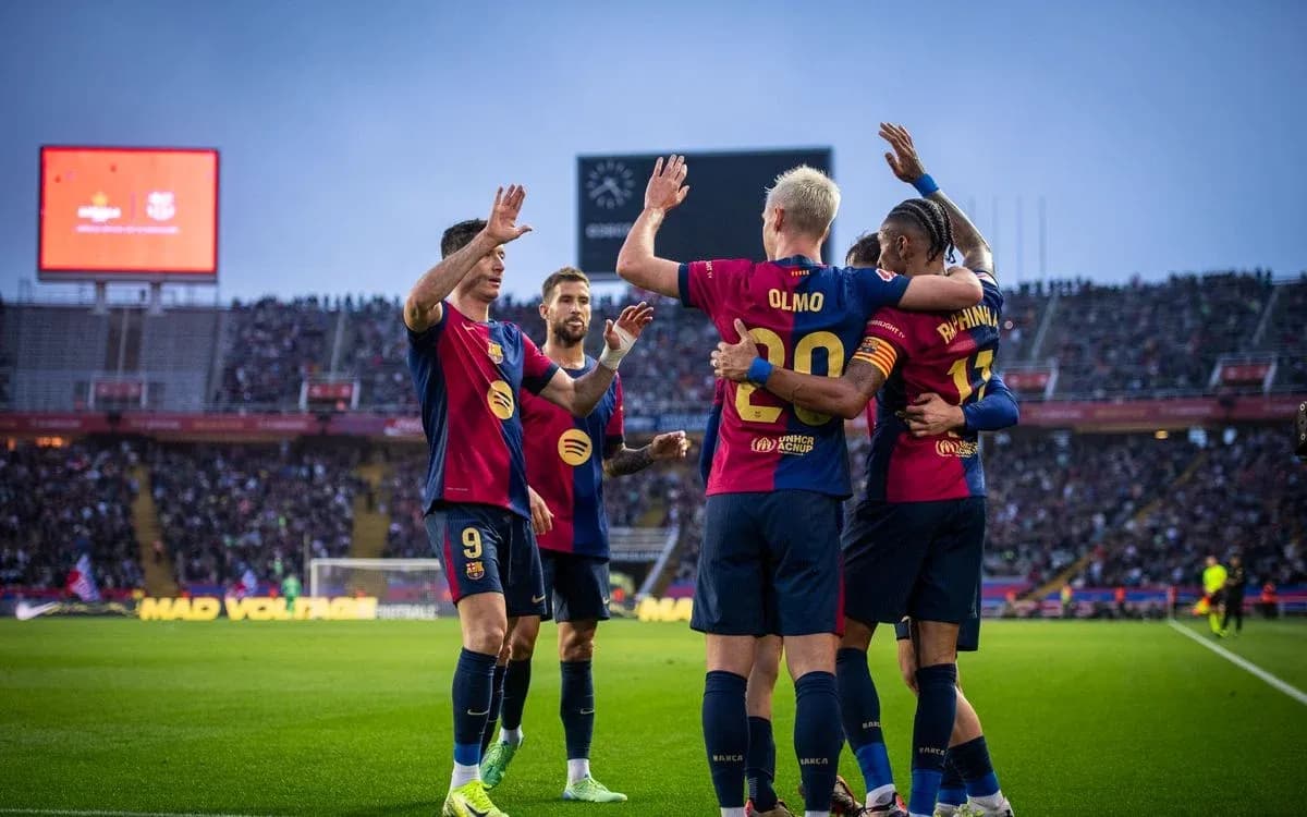 Barcelona players celebrating a goal during match