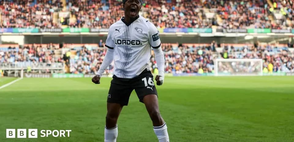 Player celebrating a goal on the pitch