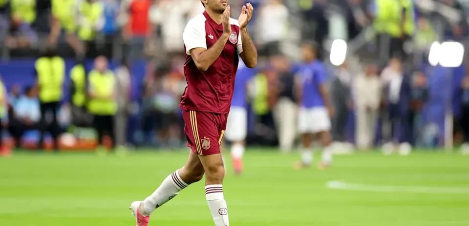 Player applauding fans after the match