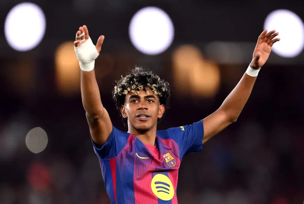 Player celebrating with raised arms after match