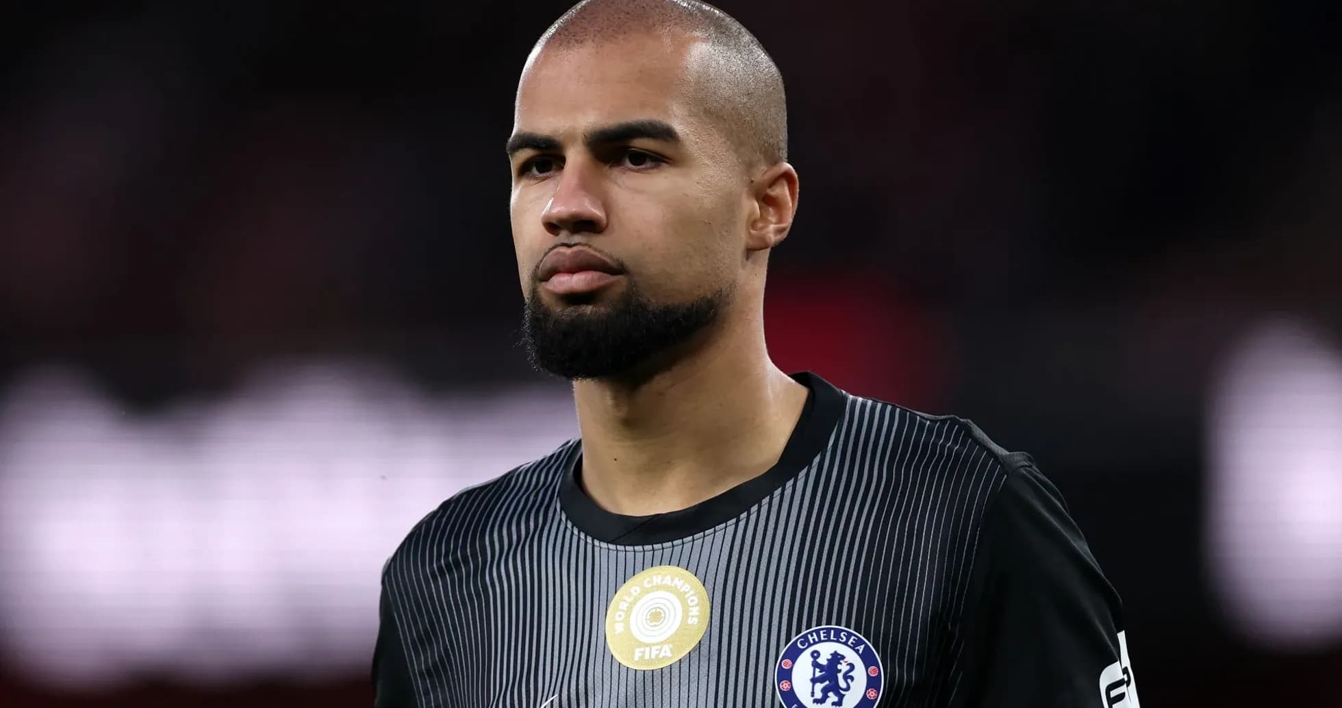 Player in Chelsea jersey during match preparation