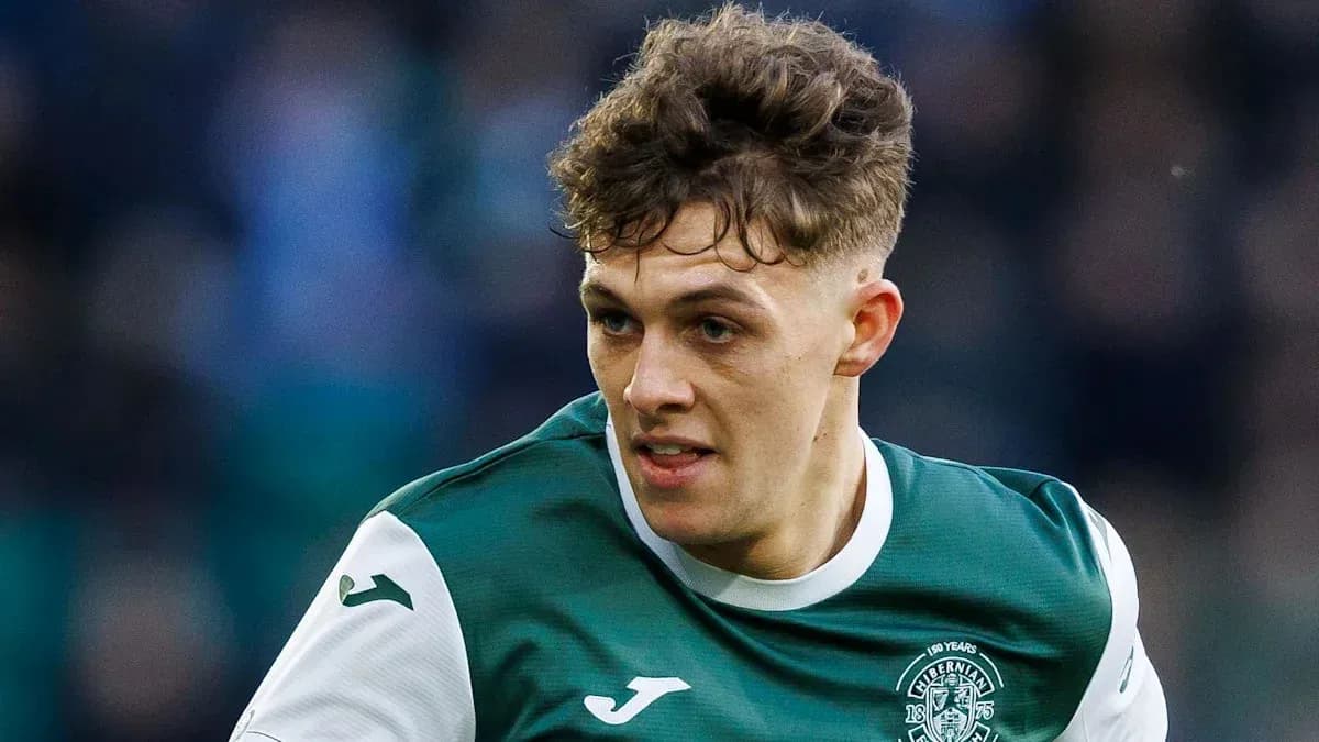 Player in Hibernian kit during match action