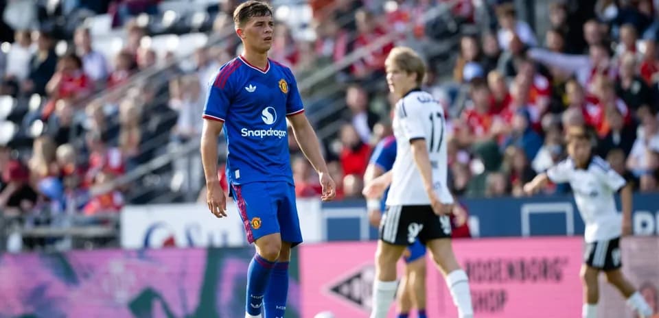 Player in blue Manchester United kit during match