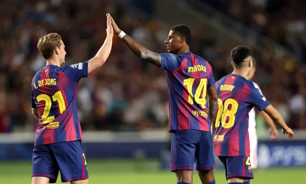 Players celebrating a goal during match