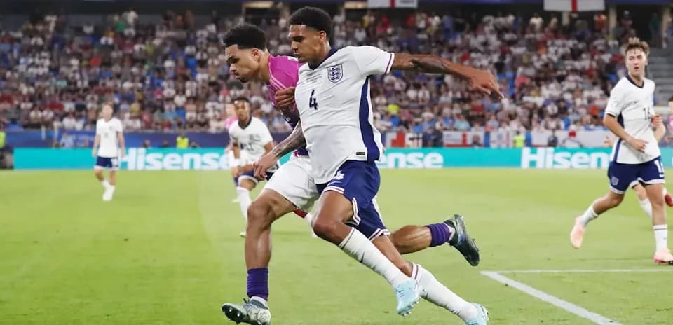 England players battling for the ball in match