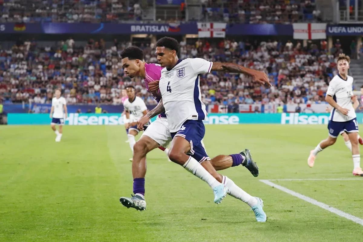 England players battling for the ball in match