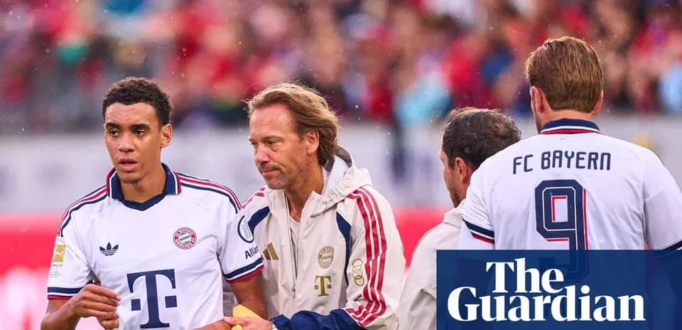 Bayern Munich players interacting on the sidelines