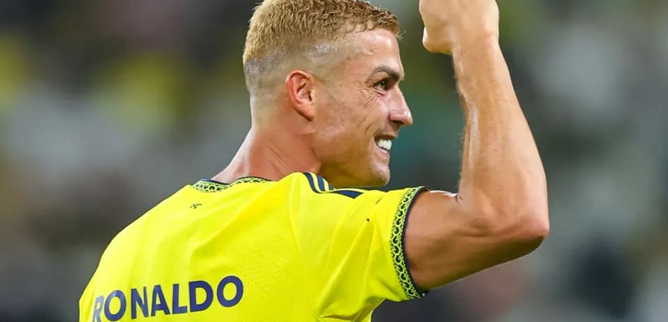 Player celebrating with raised fist on the field