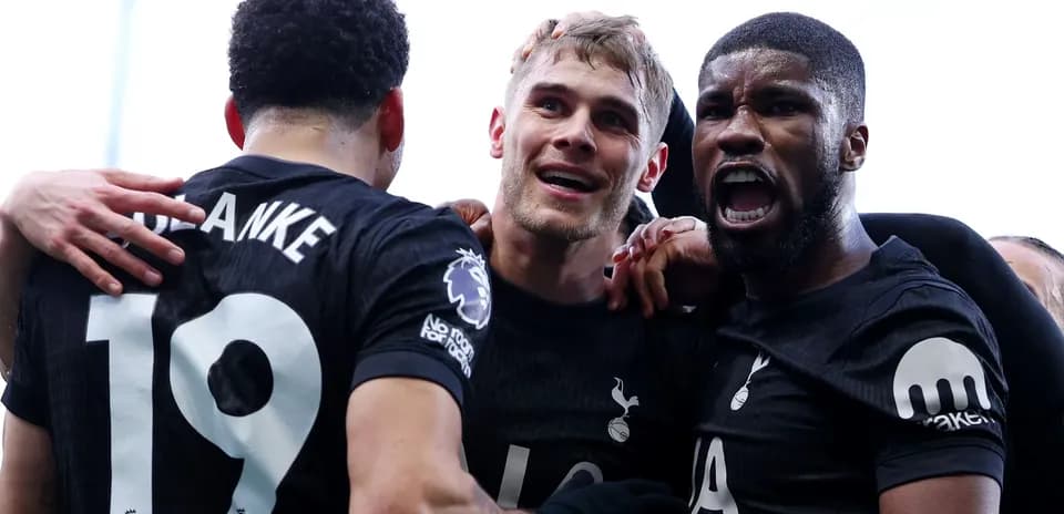 Tottenham players celebrating a goal together