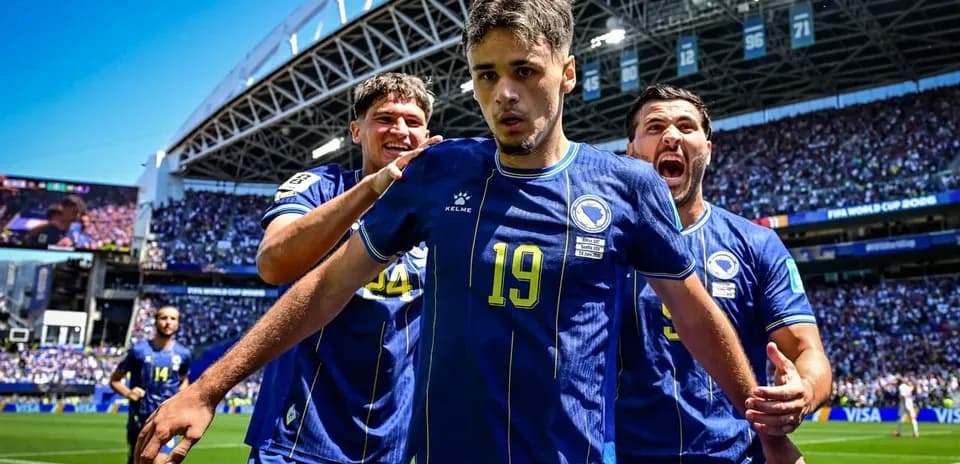 Players celebrating a goal during FIFA World Cup match