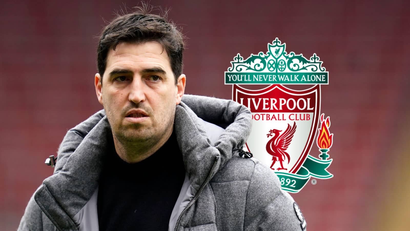 Coach in front of Liverpool FC logo