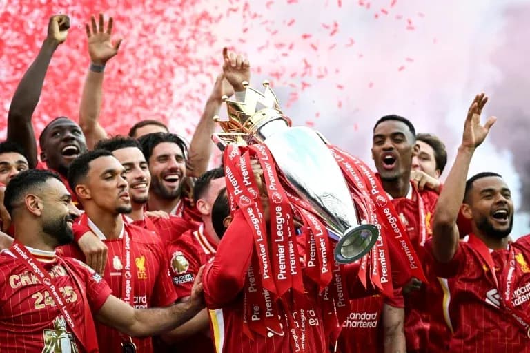 Liverpool players celebrating Premier League trophy victory
