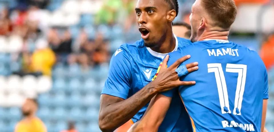 Players celebrating a goal during UEFA match