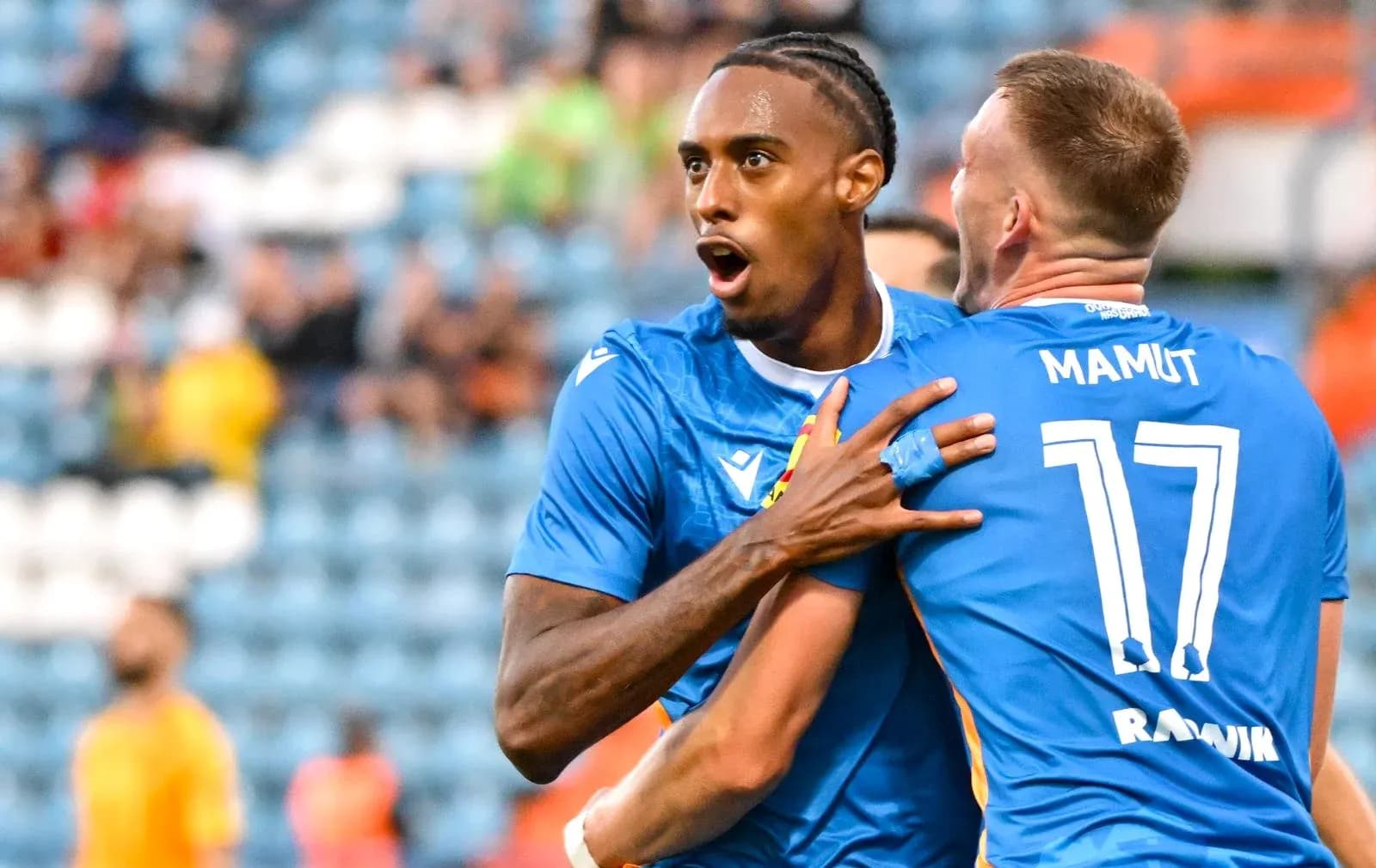 Players celebrating a goal during UEFA match