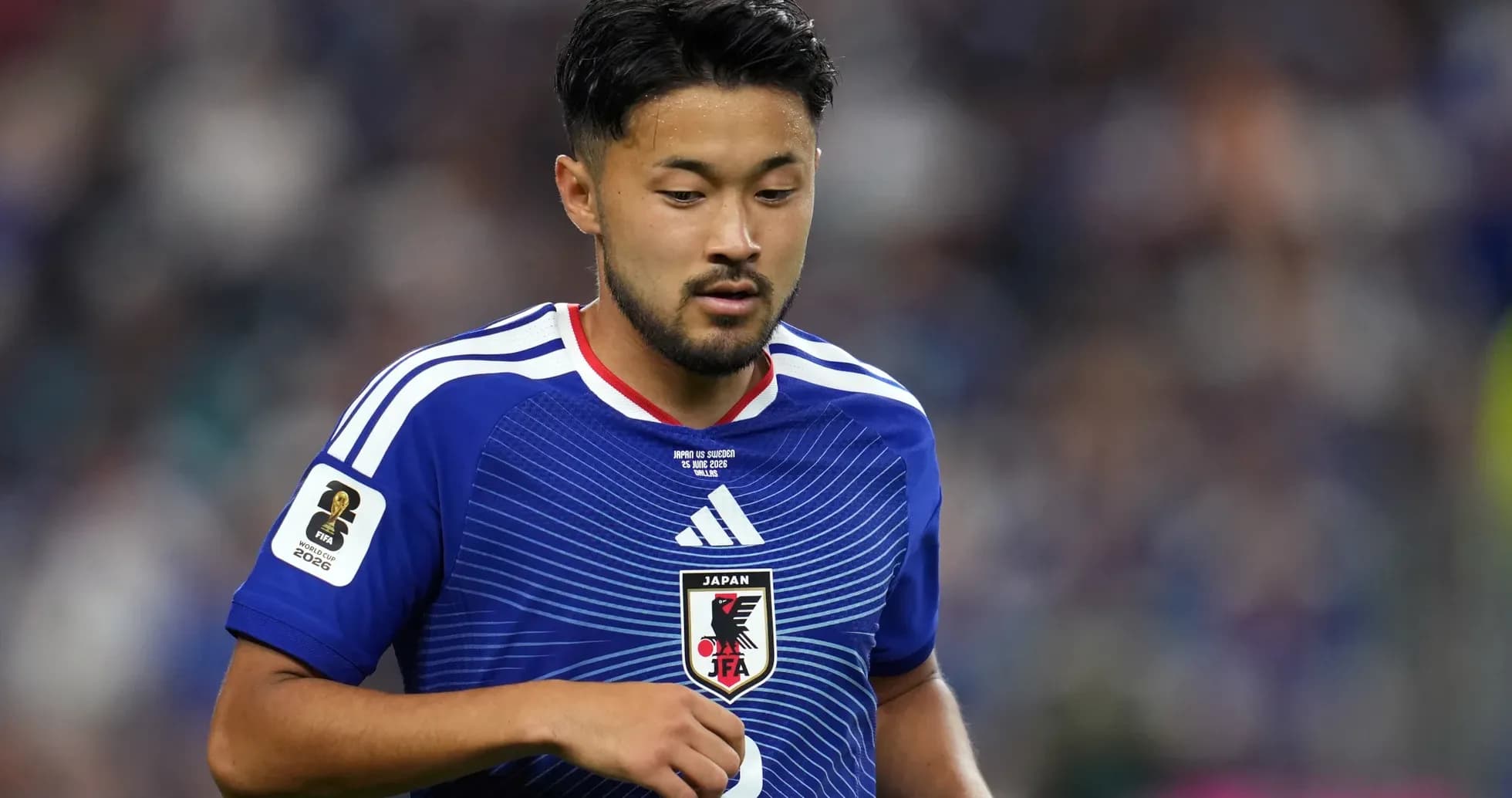 Japan player wearing blue jersey during match