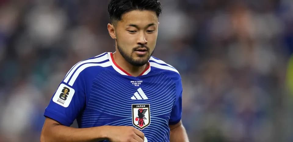 Japan player wearing blue jersey during match
