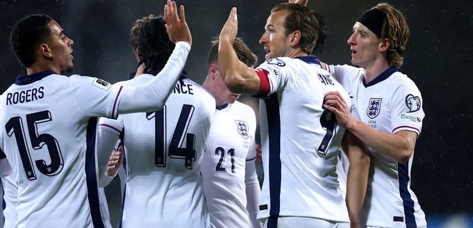 England players celebrating a goal during match