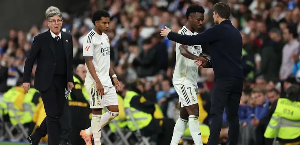 Real Madrid players being substituted during match