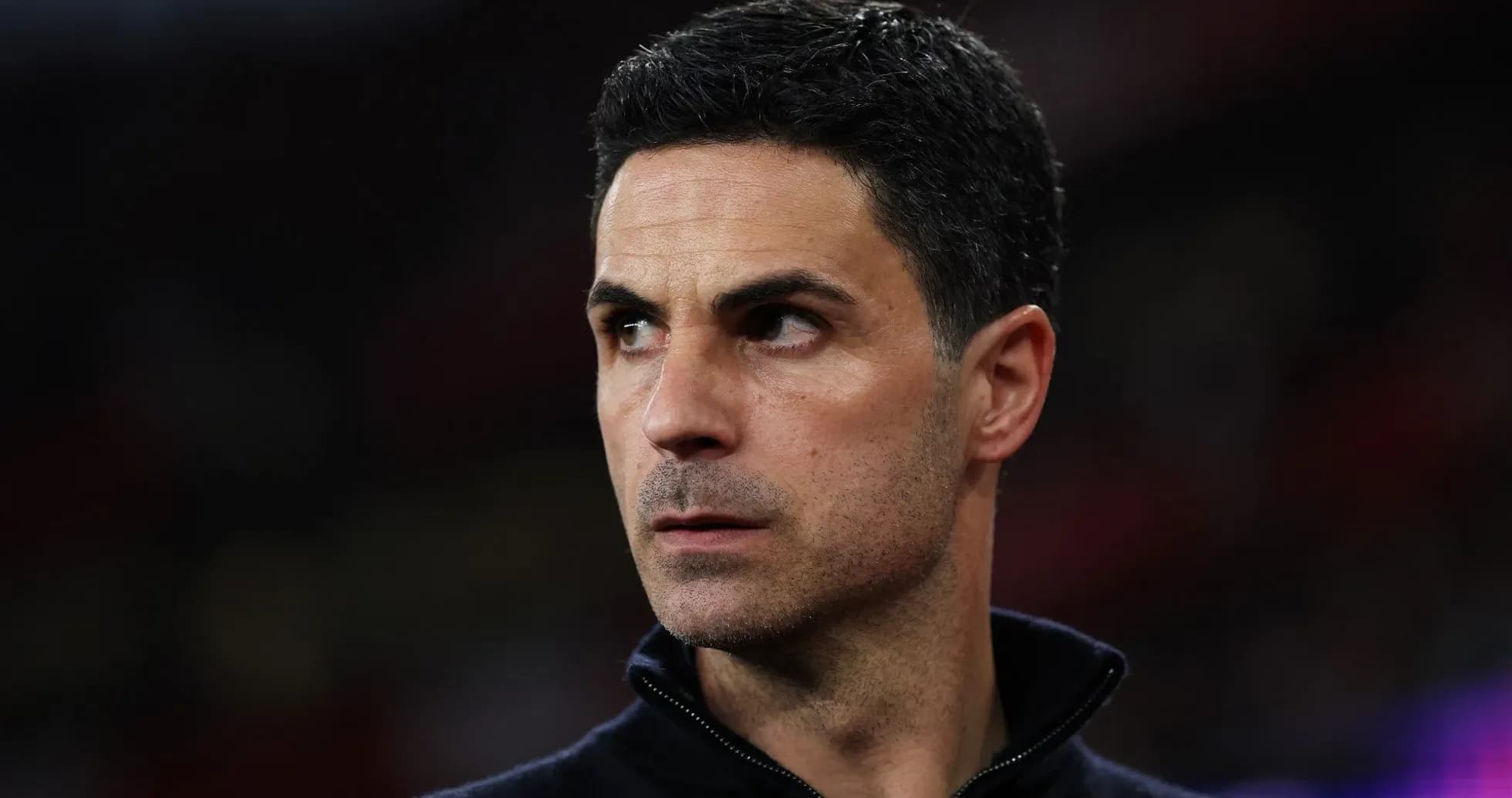 Manager looking focused during match preparation