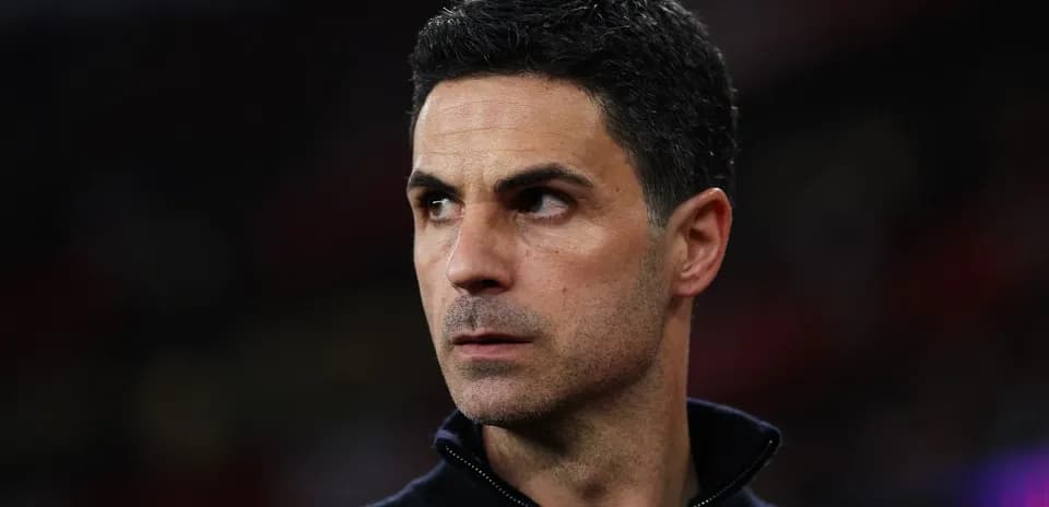 Manager looking focused during match preparation