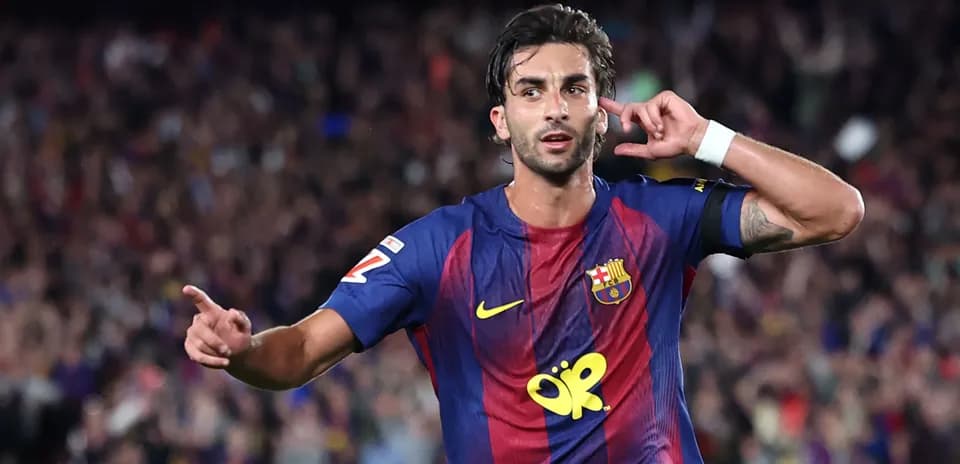 Player celebrating a goal with hand gesture