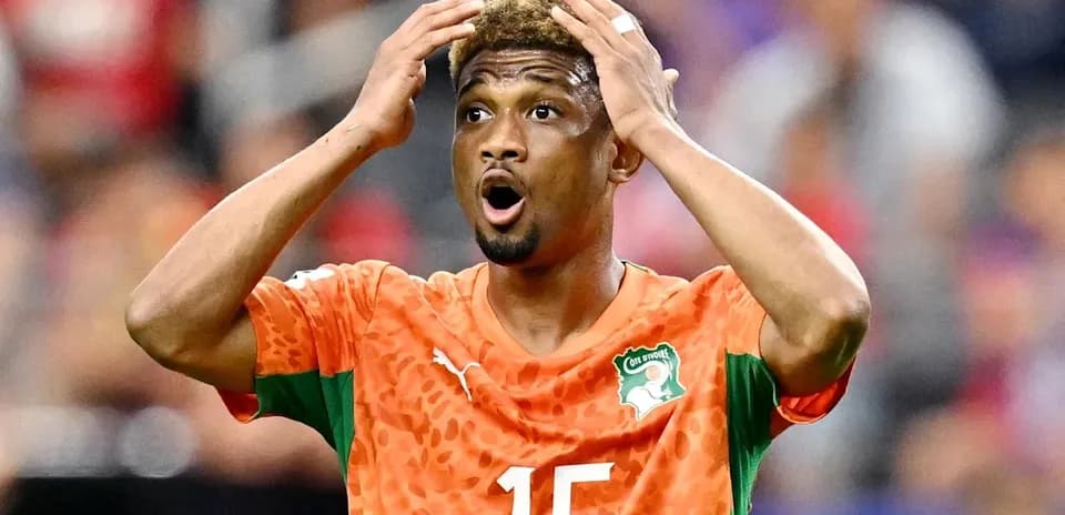 Player with hands on head during match