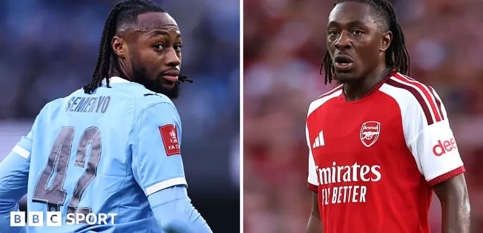 Two football players in their team kits