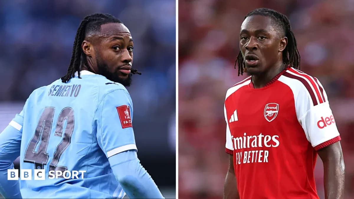 Two football players in their team kits