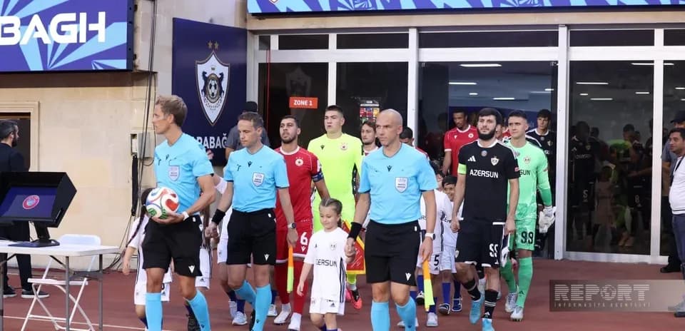 Teams entering the field for UEFA Europa League match