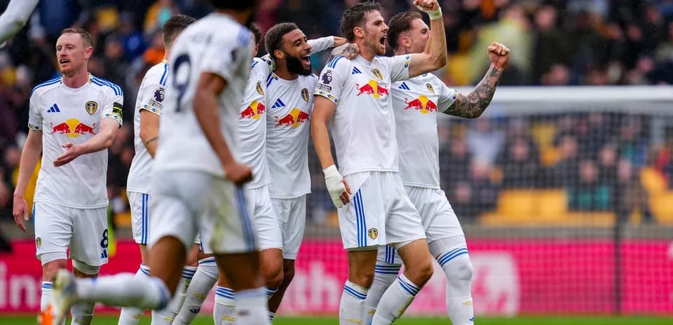 Leeds players celebrating a goal during match