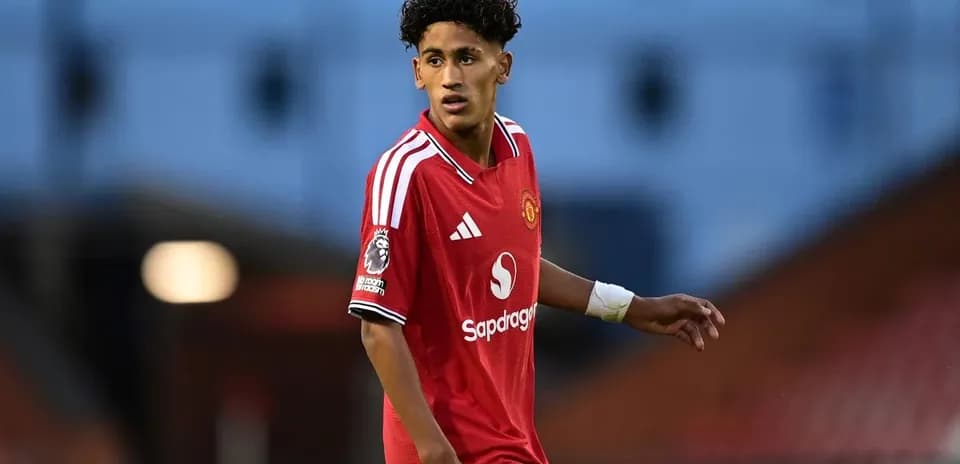 Player in red jersey during football match