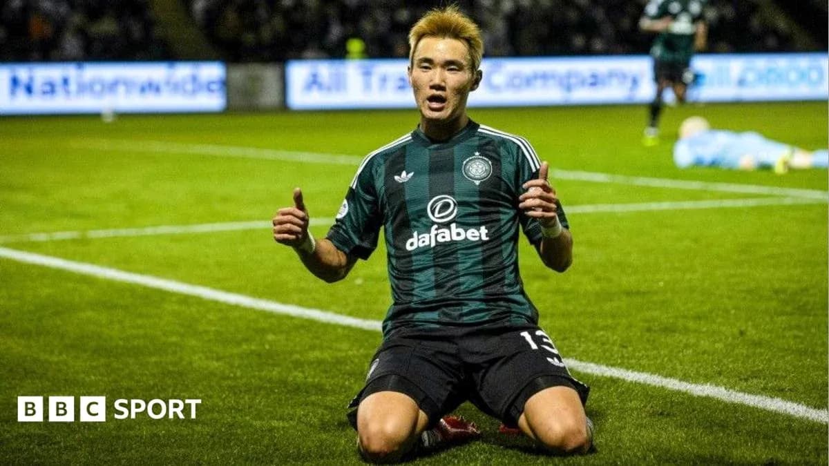 Player celebrating on the field after scoring a goal