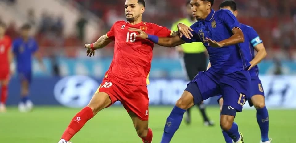 Two players contesting the ball during a match
