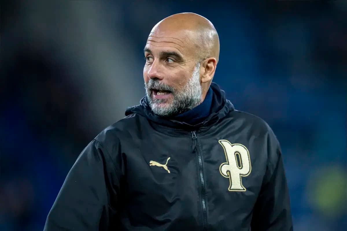 Coach wearing Puma jacket during match warm-up