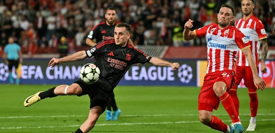 Player kicking ball during UEFA Champions League match