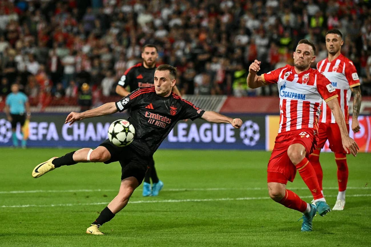 Player kicking ball during UEFA Champions League match