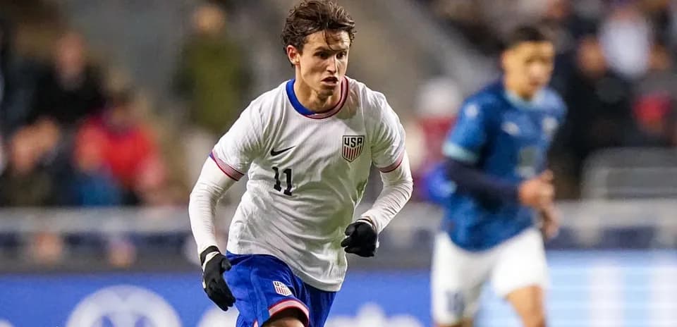 Player running during a soccer match for USA