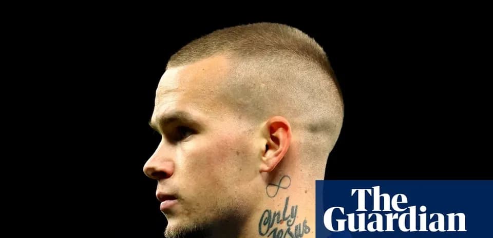 Profile of a player with a buzz cut