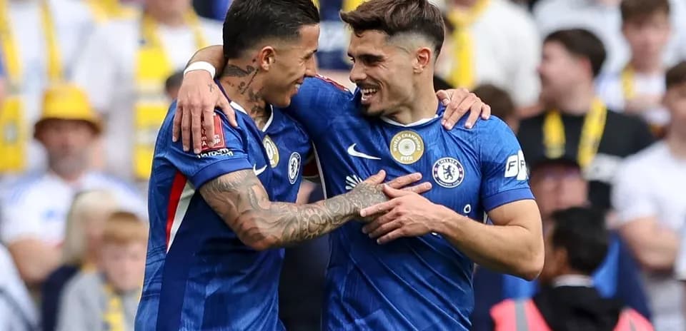 Chelsea players celebrating a goal together