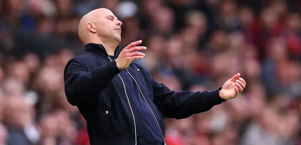 Coach gesturing during a match from the sidelines