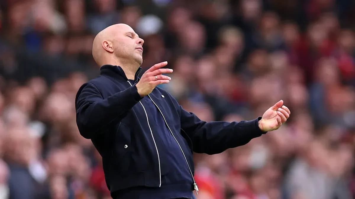 Coach gesturing during a match from the sidelines