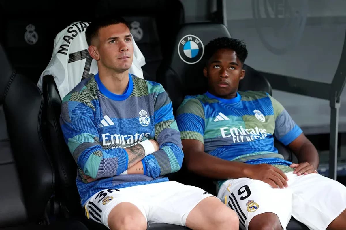 Real Madrid players sitting on the bench during match