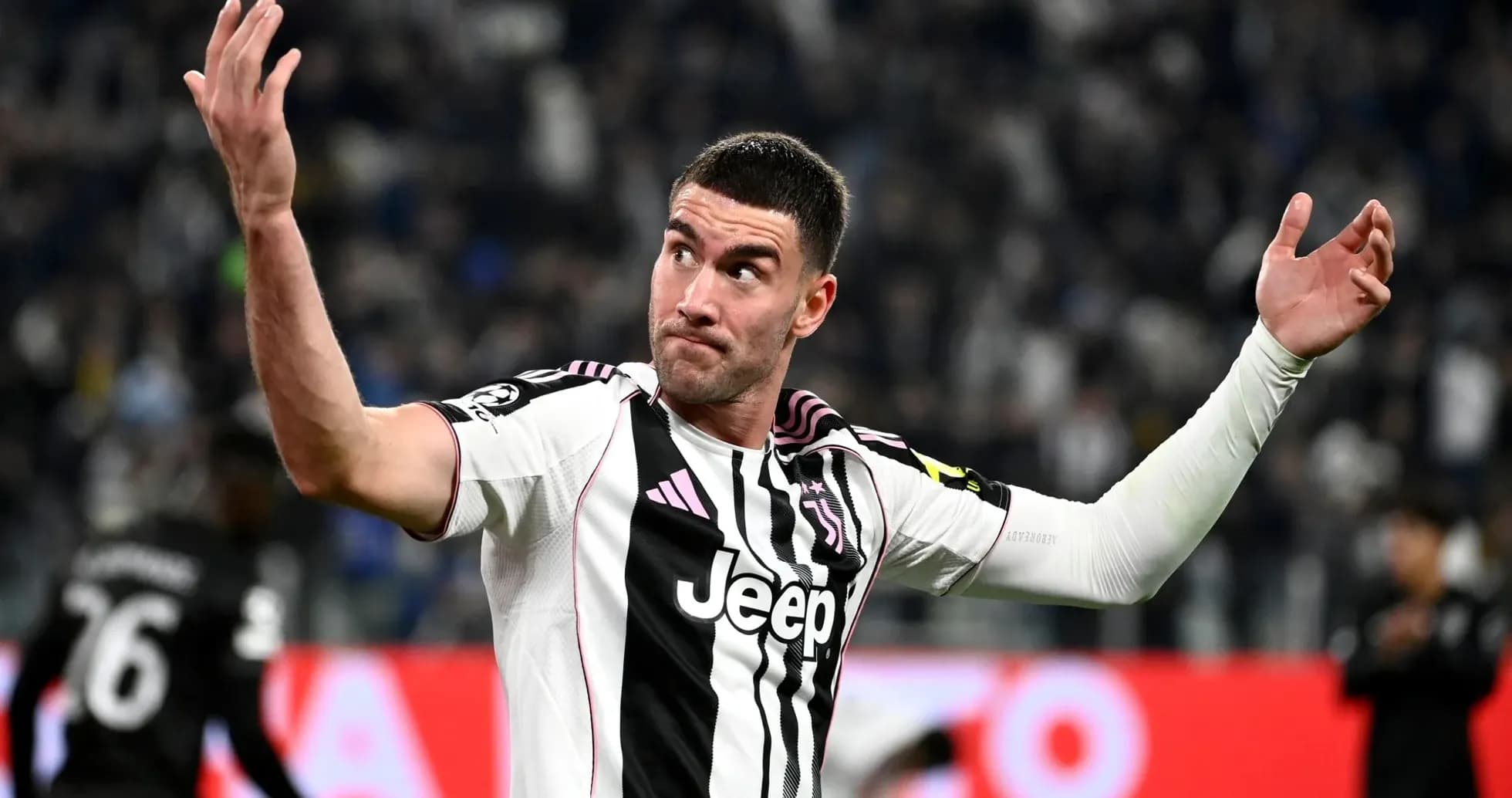 Juventus player gesturing during a match
