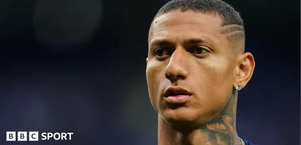 Close-up of player with short hair and tattoo