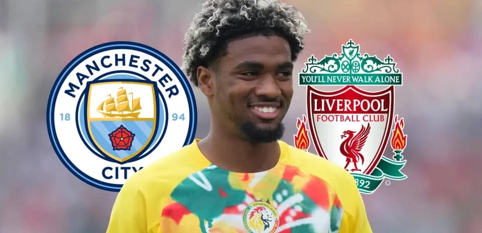 Player smiling with Manchester City and Liverpool logos