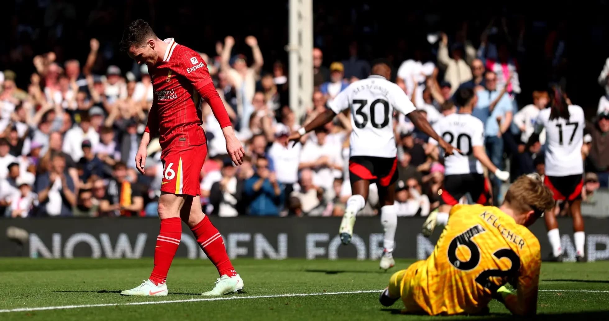 Liverpool player reacting after Fulham goal