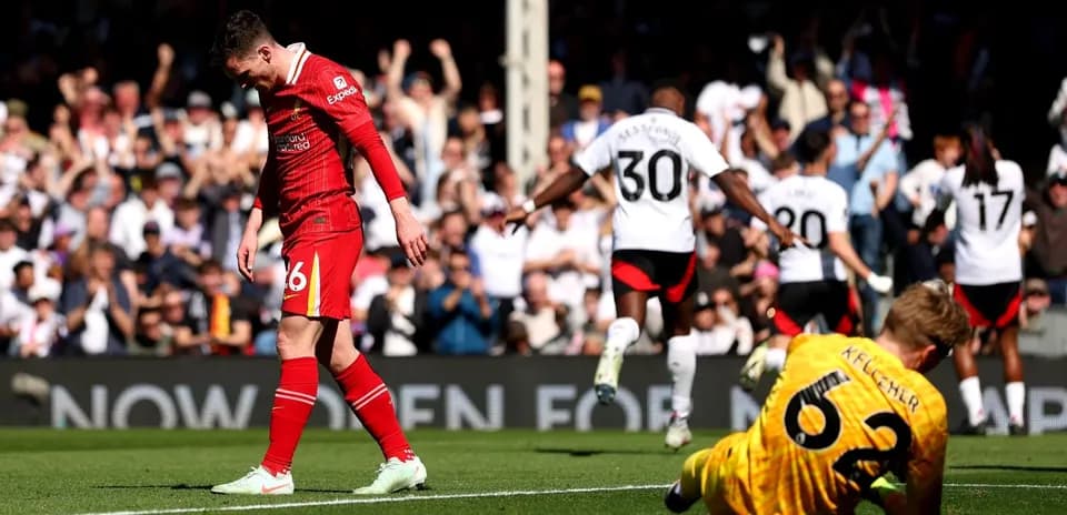 Liverpool player reacting after Fulham goal