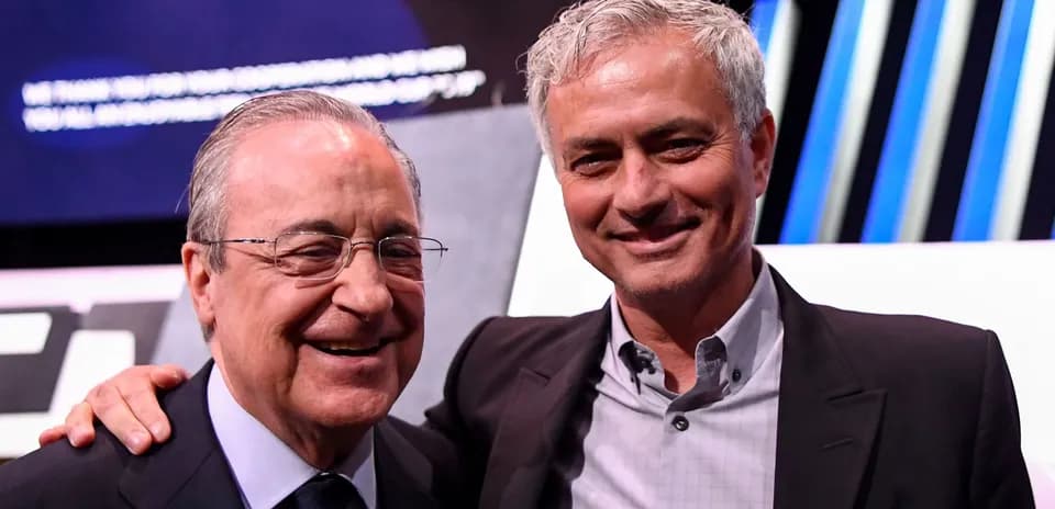 Two men posing together at an event