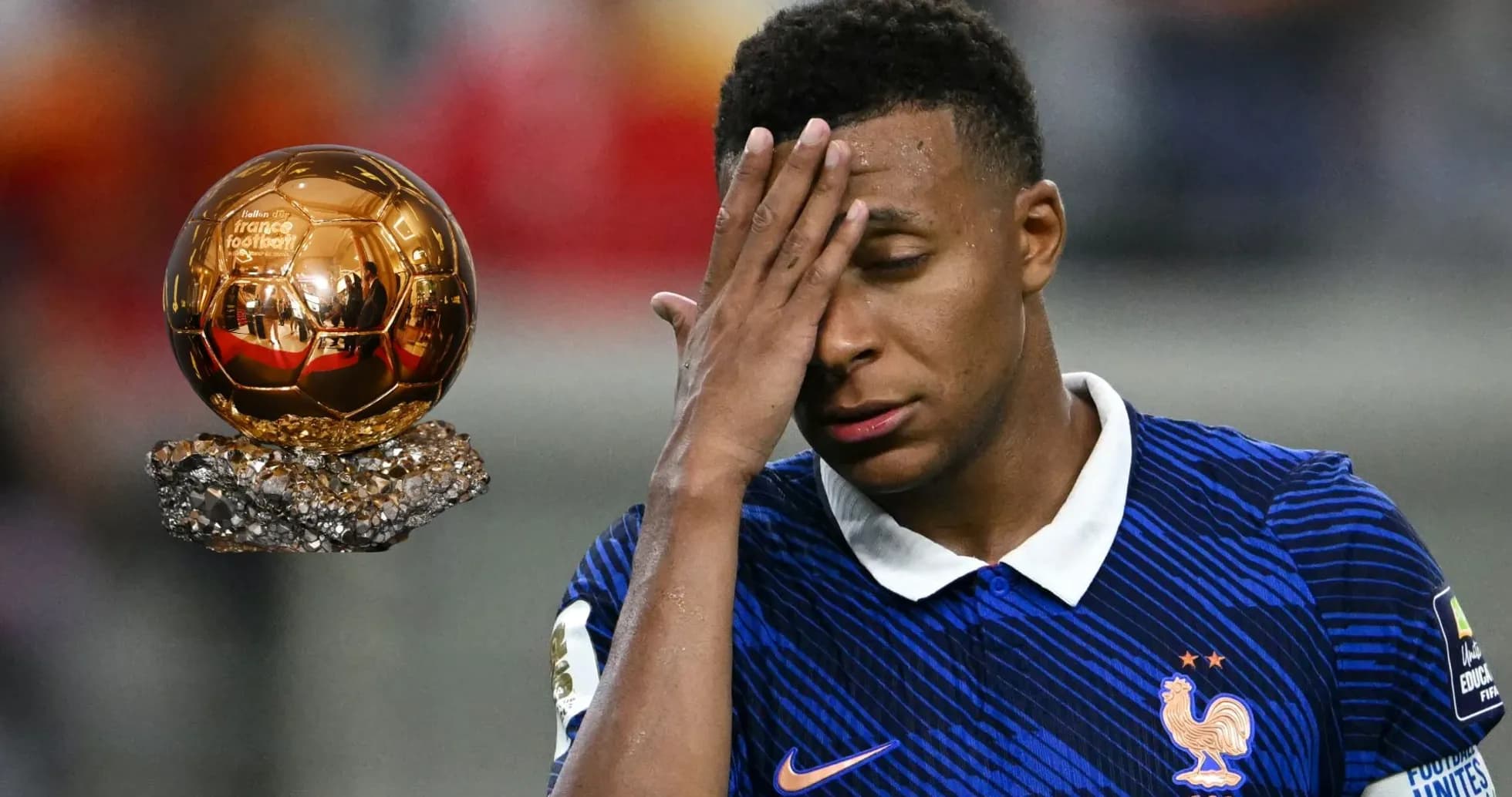 Player with hand on forehead near Ballon d'Or trophy